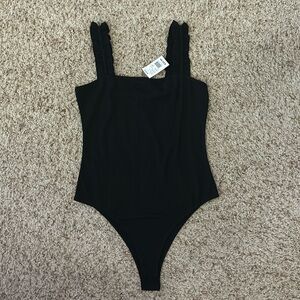 Women’s Black ruffle sleeve bodysuit